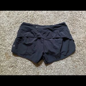 Lululemon speed up 2.5” high rise shorts.